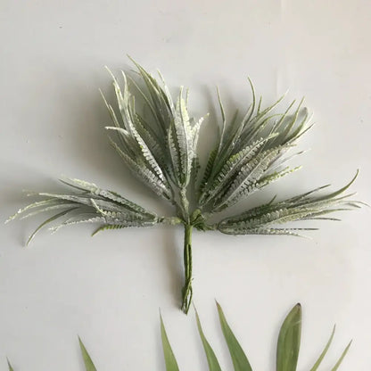 Frosted green artificial fern cluster with spiky fronds and textured stem in greenery berry stamen decorbites bundle