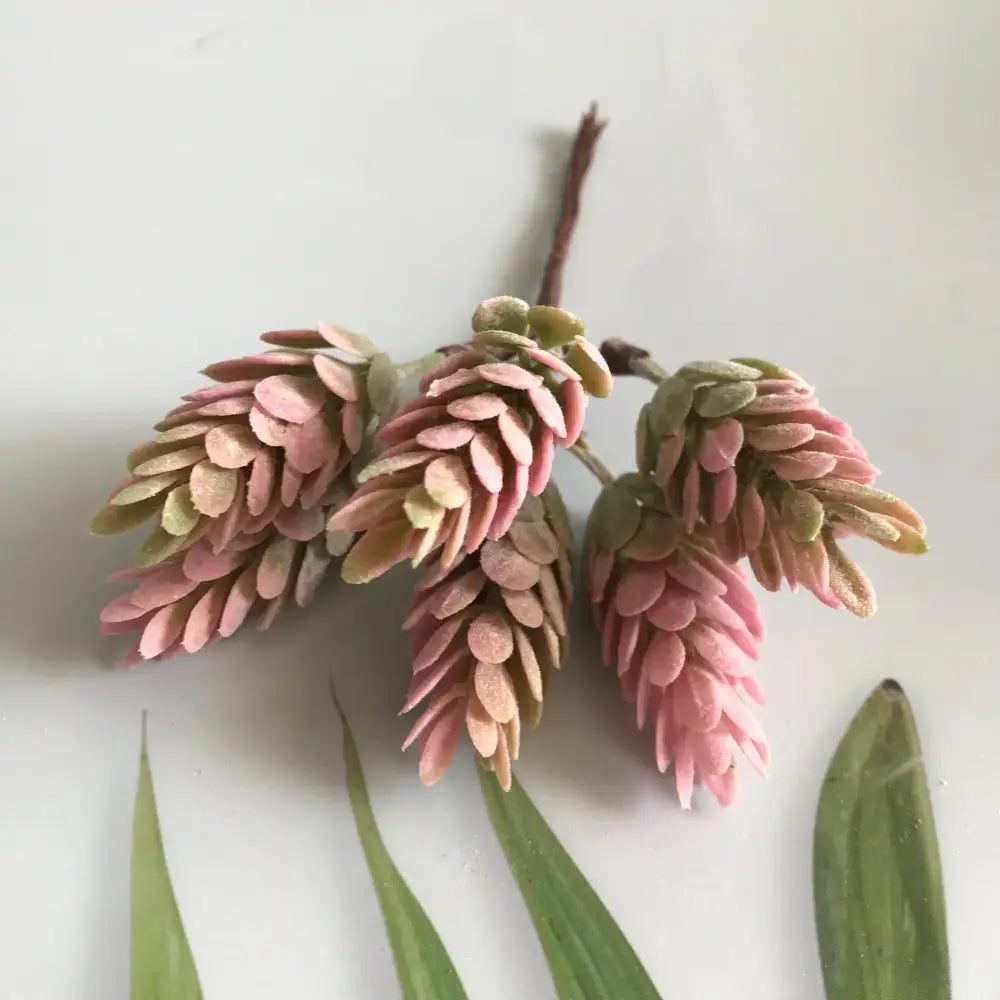 Pink and green artificial pinecone cluster with textured layered scales in frosted greenery berry stamen bundle decor for diy
