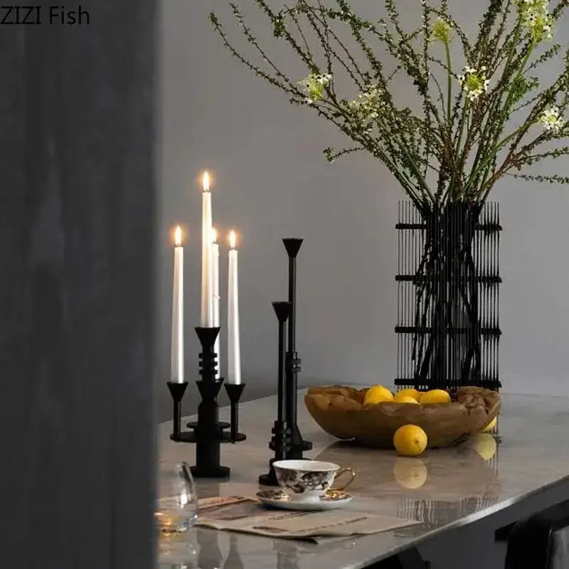 Black metal candle holder with three lit white candles for decorbites frosted metal candle romantic dining room decor