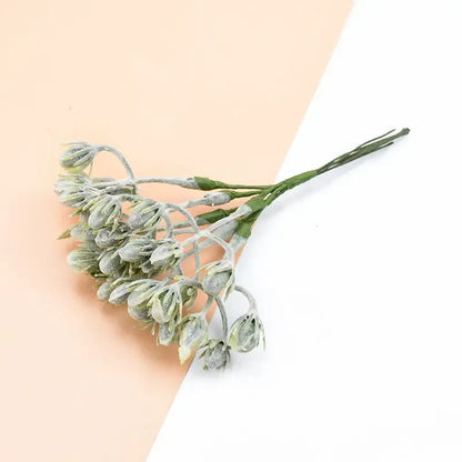A delicate artificial plants bouquet with frosted green and white dried flowers for decorbites decorative artificial decor