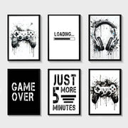 Set of six black and white game controller wall art prints with splattered ink designs from DecorBites™