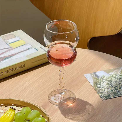 Clear glass gem spark coupe goblet with gold bead decoration on slender stem for elegant dining room decorbites gem spark