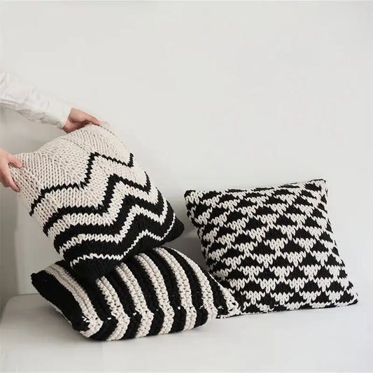 Black and white geo knit stripe square pillow with bold zigzag and striped patterns for bedroom decorbites decor