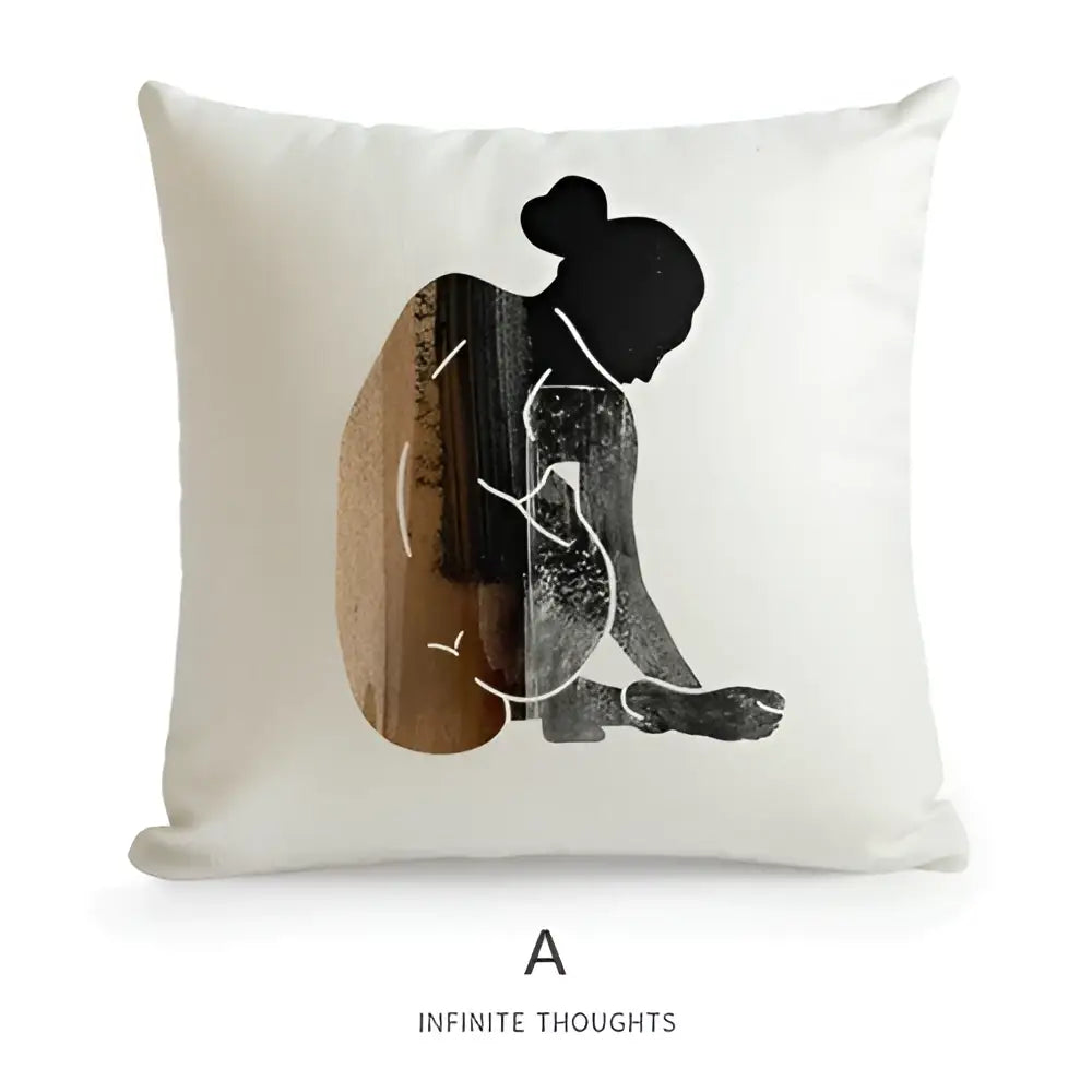 White cushion cover featuring a minimalist black and earthy brown abstract silhouette for decorbites geometric artist sofa