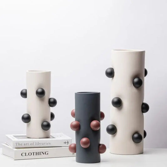 Three ceramic geometric ball vases in cream with black and gray with rose-gold for living room decorbites geometric ball