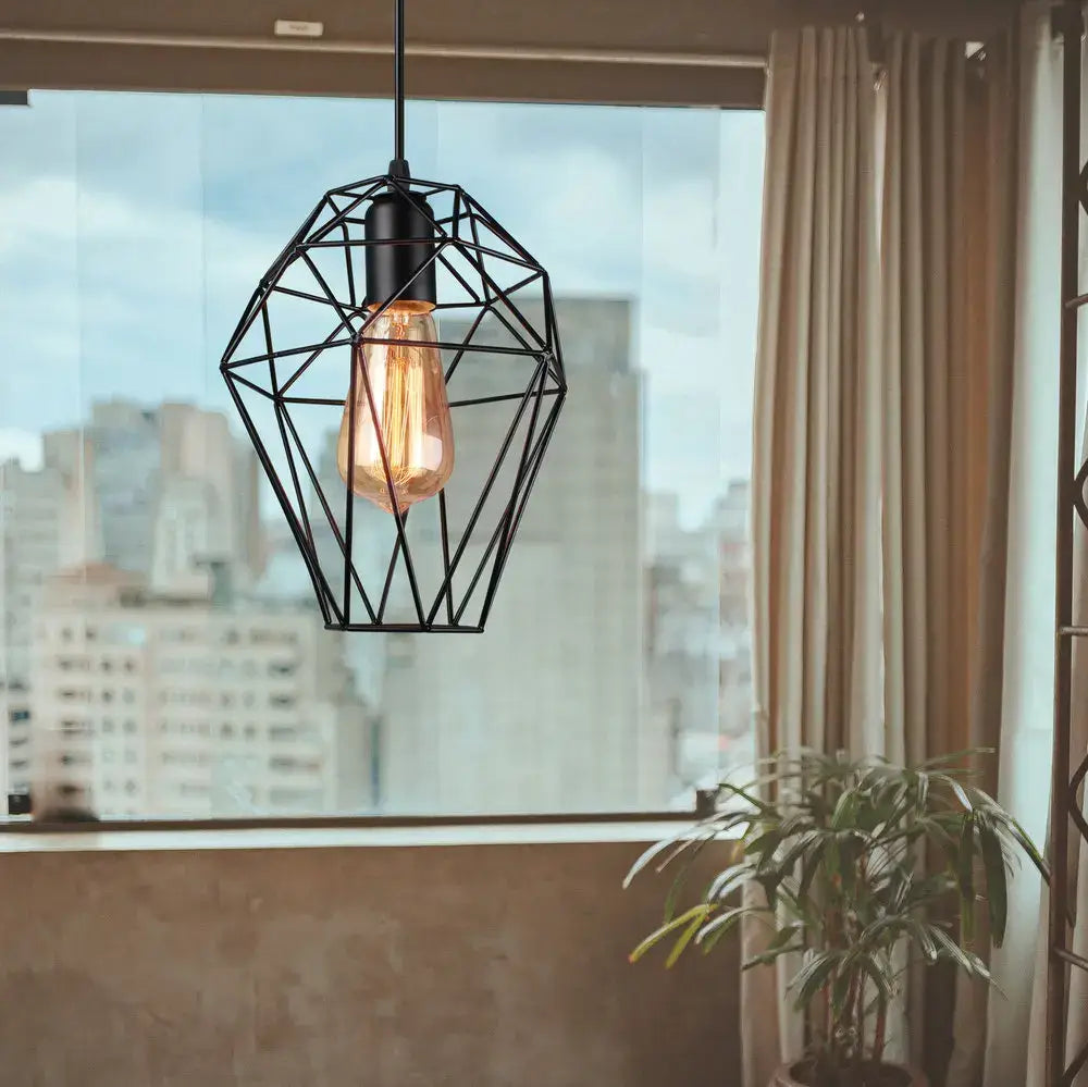 Black geometric wire pendant light with exposed edison-style bulb for decorbites birdcage diamond ceiling use