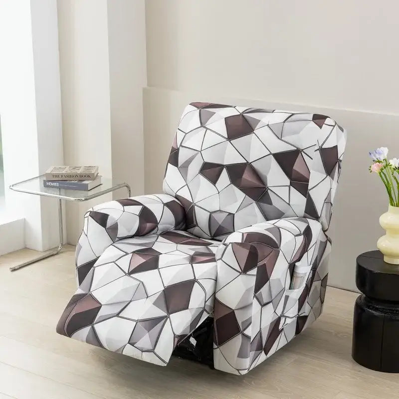 A sleek geometric-patterned recliner cover in white and dark gray tones with a modern faceted design for living room use