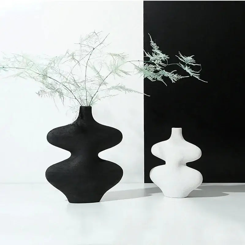 Black and white geometric ceramic vase set with organic sculptural forms ideal for living room decorbites decor