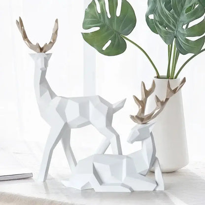 White geometric deer sculpture with gold-toned antlers by decorbites ideal for living room decor