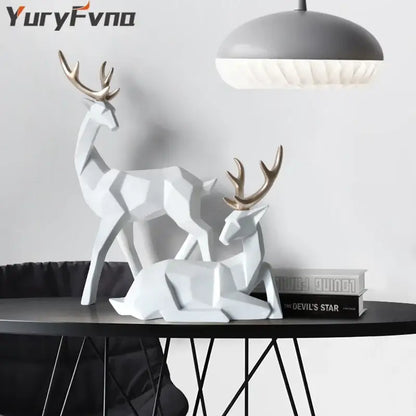 White and gold faceted decorbites deer sculpture with geometric design and gold antlers for living room decor