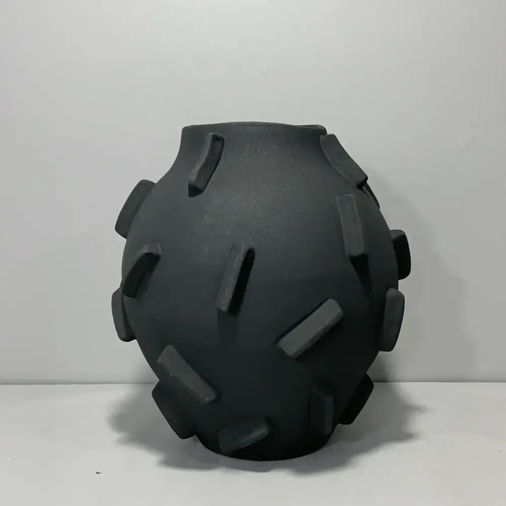 Black ceramic block ceramic vase with rounded body and rectangular ridges for green and beige living room decorbites geometric block decor