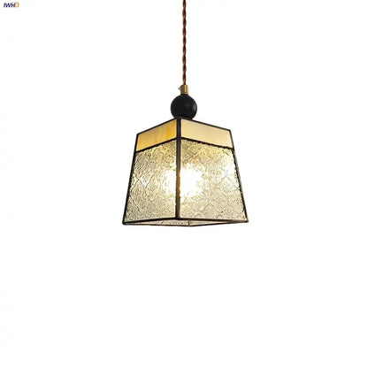 Geometric brass and clear glass led pendant light with textured panels for dining room featuring decorbites clear glass