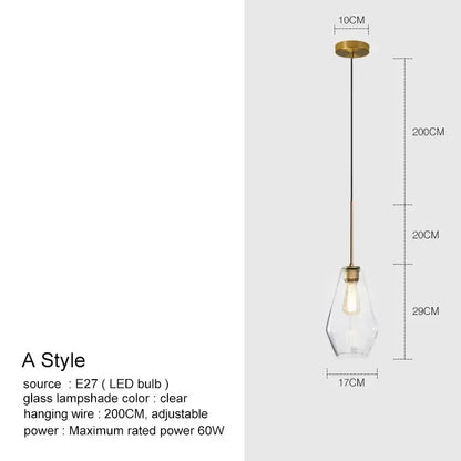A modern brass-finished pendant light with a clear faceted glass chandelier lighting and adjustable 200cm wire