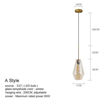 A modern amber glass pendant light with brass finish and adjustable wire for kitchen glass chandelier lighting