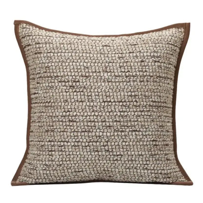 Beige and brown woven throw pillow with chunky knit pattern and geometric brown leather splicing for living room decorbites