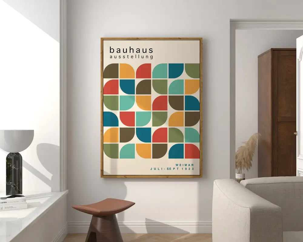 A framed DecorBites™ bauhaus geometric canvas print with colorful semicircles for stylish home decor