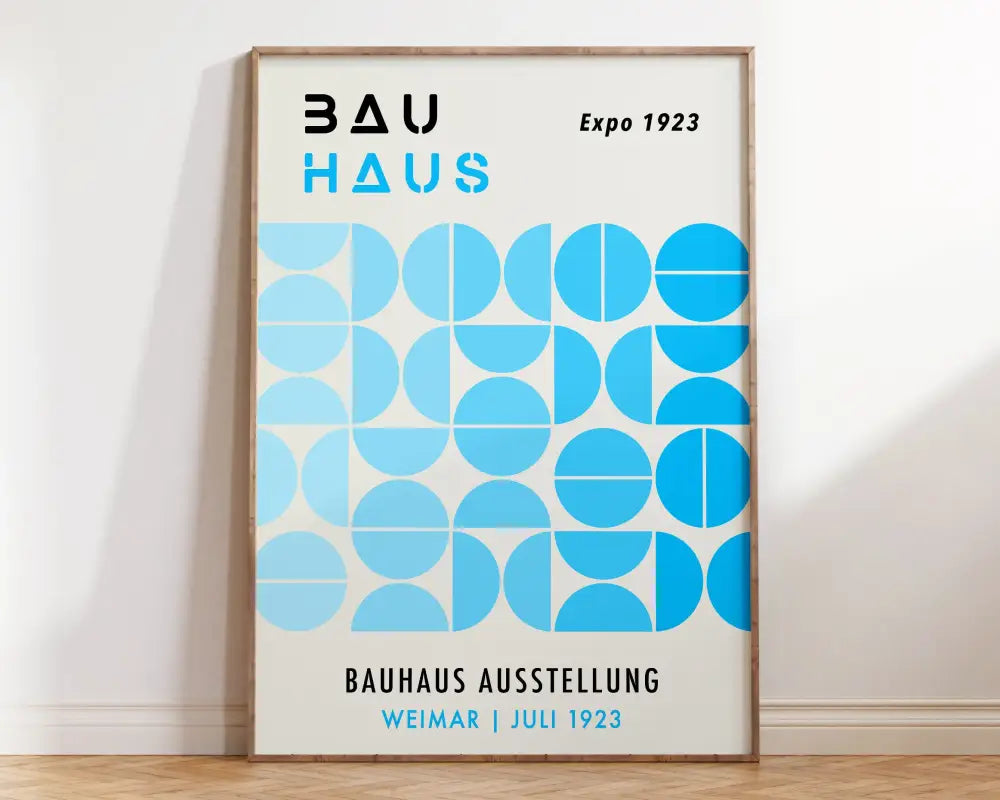 A framed DecorBites bauhaus geometric canvas print with blue circles and bold black text for home decor use