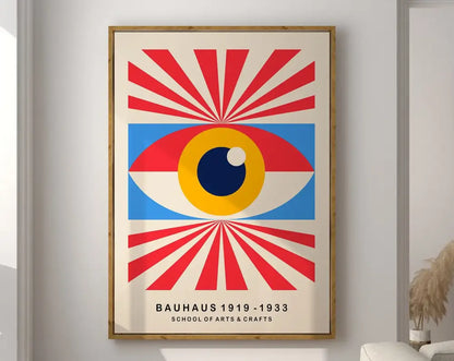 A framed DecorBites™ bauhaus geometric canvas print with a bold eye design featuring red blue and yellow rays
