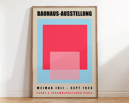 Minimalist framed bauhaus geometric canvas print in red and pink on light blue for stylish home decor by DecorBites