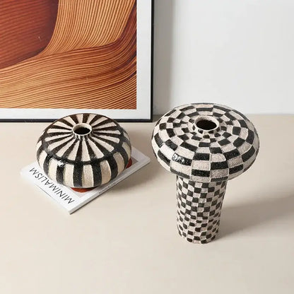Two black and white ceramic vases with geometric check and radial stripe patterns for living room decorbites geometric check