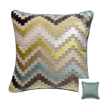A square cushion cover with bold yellow beige brown teal zigzag pattern in textured velvet from decorbites geometric chenille flocking