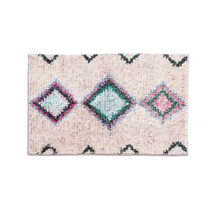Off-white decorbites boho runner bath mat with textured surface and mint green pink diamond patterns for entryway use