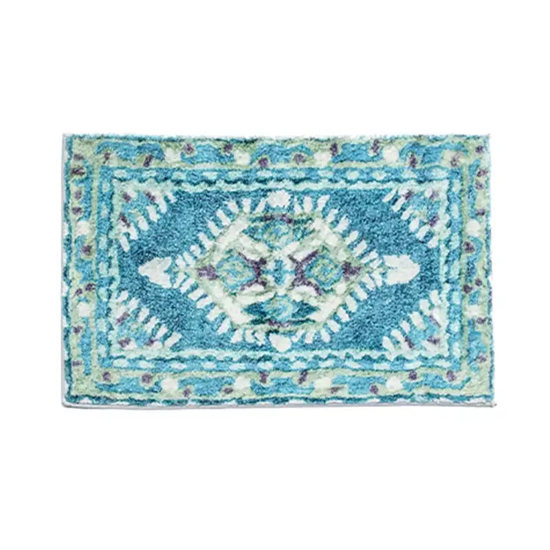 A plush rectangular decorbites boho runner bath mat in blue and teal with white and purple geometric pattern for entryway