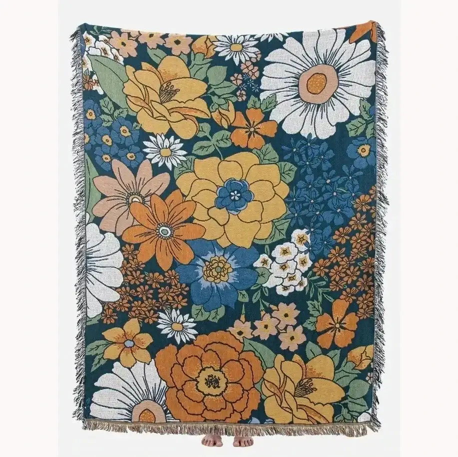 Vibrant floral geometric cotton knitted sofa blanket with oversized yellow orange blue flowers on deep teal background