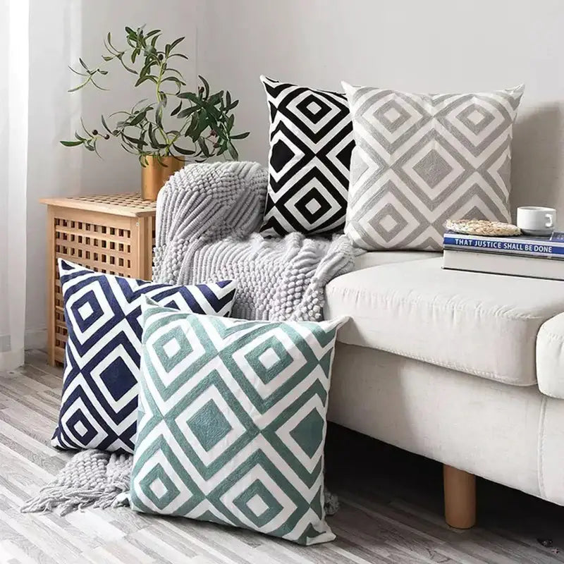 Set of four navy teal black and gray geometric embroidered cushion covers with white outlines for living room decorbites decor