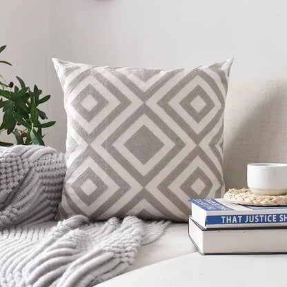 Square cushion cover with gray and white decorbites geometric embroidered diamond pattern on textured fabric for living room decor