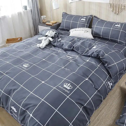 Gray grid-patterned bedding set with white crown and mustache motifs from decorbites geometric floral bedding collection
