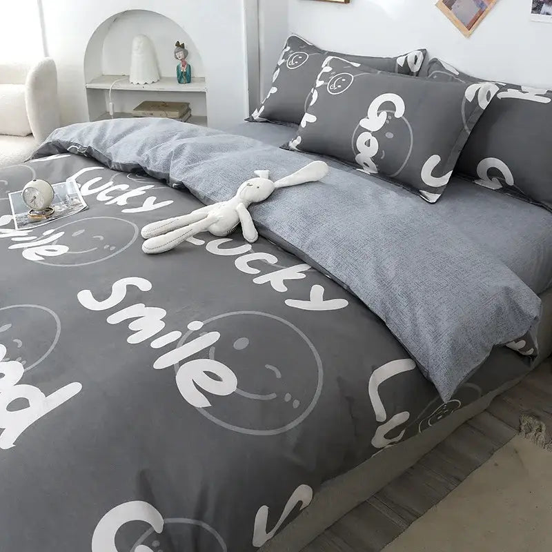 Gray duvet cover bedding set with white lucky smile text and smiley patterns for decorbites geometric floral bedding