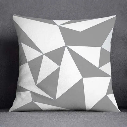 A square pillow case with a decorbites geometric floral print of white and gray triangles for living room decor