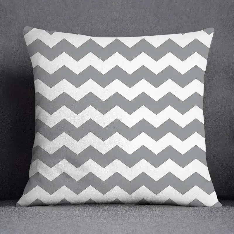 Square throw pillow case with bold chevron geometric floral print in gray and white for decorbites living room decor