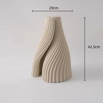 Cream-colored geometric folding ceramic vase with sculpted ribbed design for living room decor by decorbites geometric folding