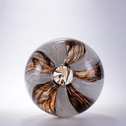 A translucent glass flower vase with swirling brown and gray patterns by decorbites geometric glass for living room decor