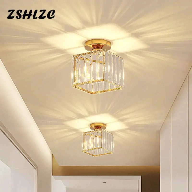 Geometric gold crystal led chandelier with faceted design and clear glass panels for dining room lighting decorbites crystal led