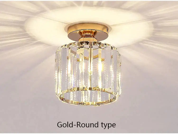 Geometric gold crystal led chandelier with vertical crystal prisms and polished brass base for living room decorbites crystal led