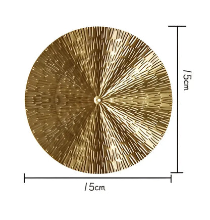 A 15cm diameter decorbites geometric golden metal wall art with radial fine line pattern for living room decor