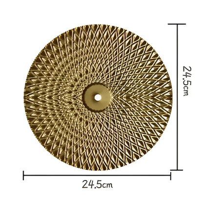 Geometric golden metal wall art featuring a gold-colored circular grinding wheel with diamond pattern decorbites design