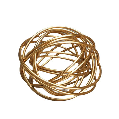 Gold-toned wire sphere decorative figurine with interwoven circular bands for decorbites geometric golden thread decor