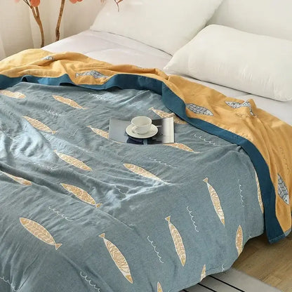 Blue and gold fish patterned cotton blanket with teal border from decorbites cotton gauze geometry summer collection