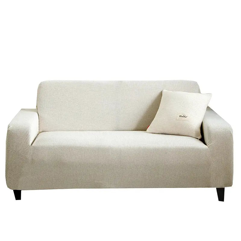 Beige textured stretch sofa cover with matching pillow embroidered with hello for living room decor