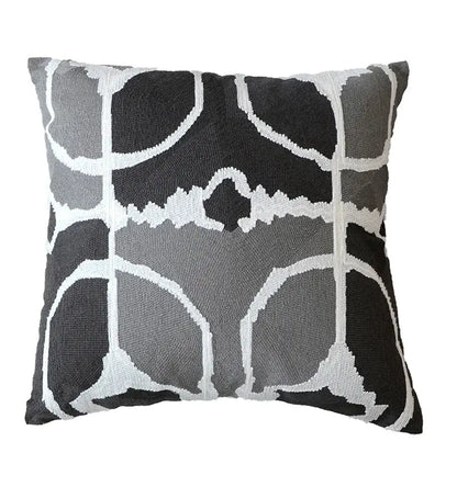 Square throw pillow with bold black gray and white abstract geometric pattern on grey embroidered cotton pillow cover decorbites