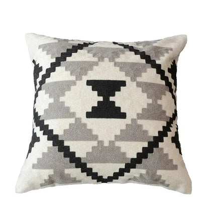 Cream-colored pillow cover with geometric black and gray pattern and embroidered design in grey embroidered cotton for decorbites decor