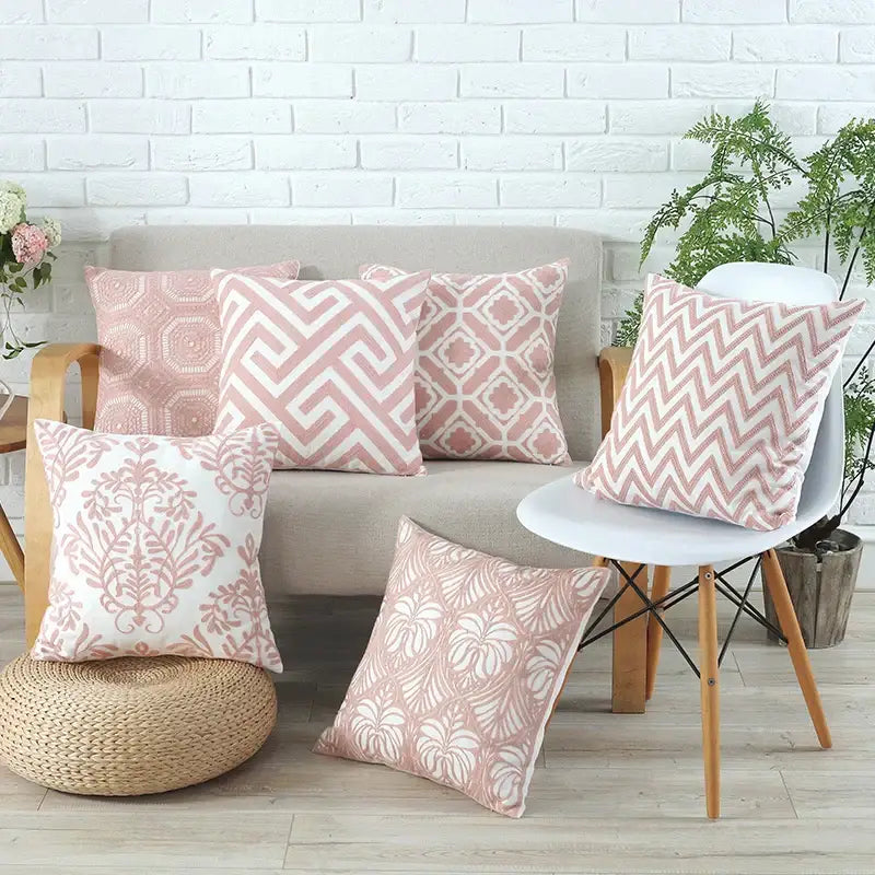 Set of five pink and white patterned throw pillows with grey pink geometric cushion cover for living room decorbites