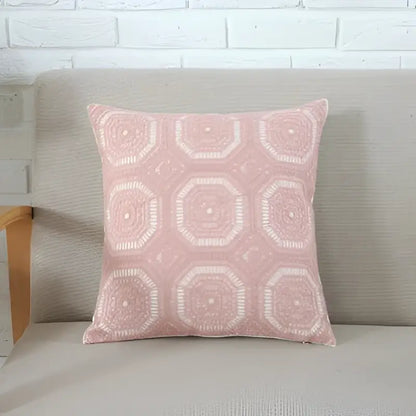A soft pink cushion cover with off-white geometric pattern and embroidered octagonal design for decorbites grey pink decor