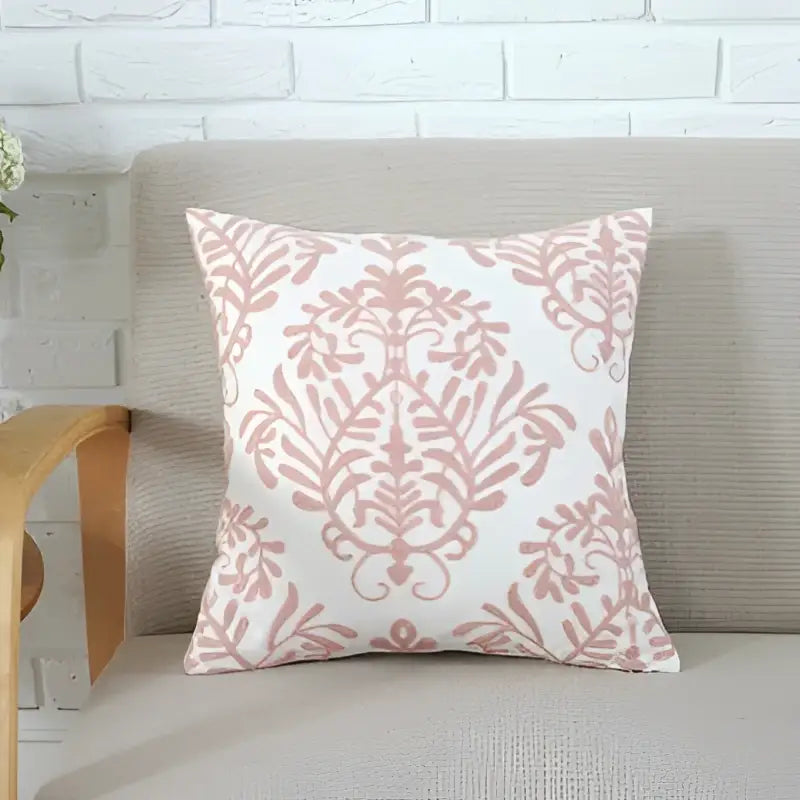 A square cushion cover with a delicate pink damask pattern on white for decorbites grey pink geometric decor