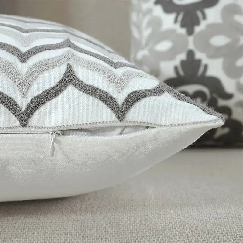 White cushion cover with gray zigzag embroidery and zipper closure for decorbites grey pink geometric decor
