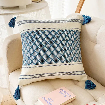 Cream-colored cushion cover with blue diamond jacquard woven design and tassels for living room decorbites blue diamond decor